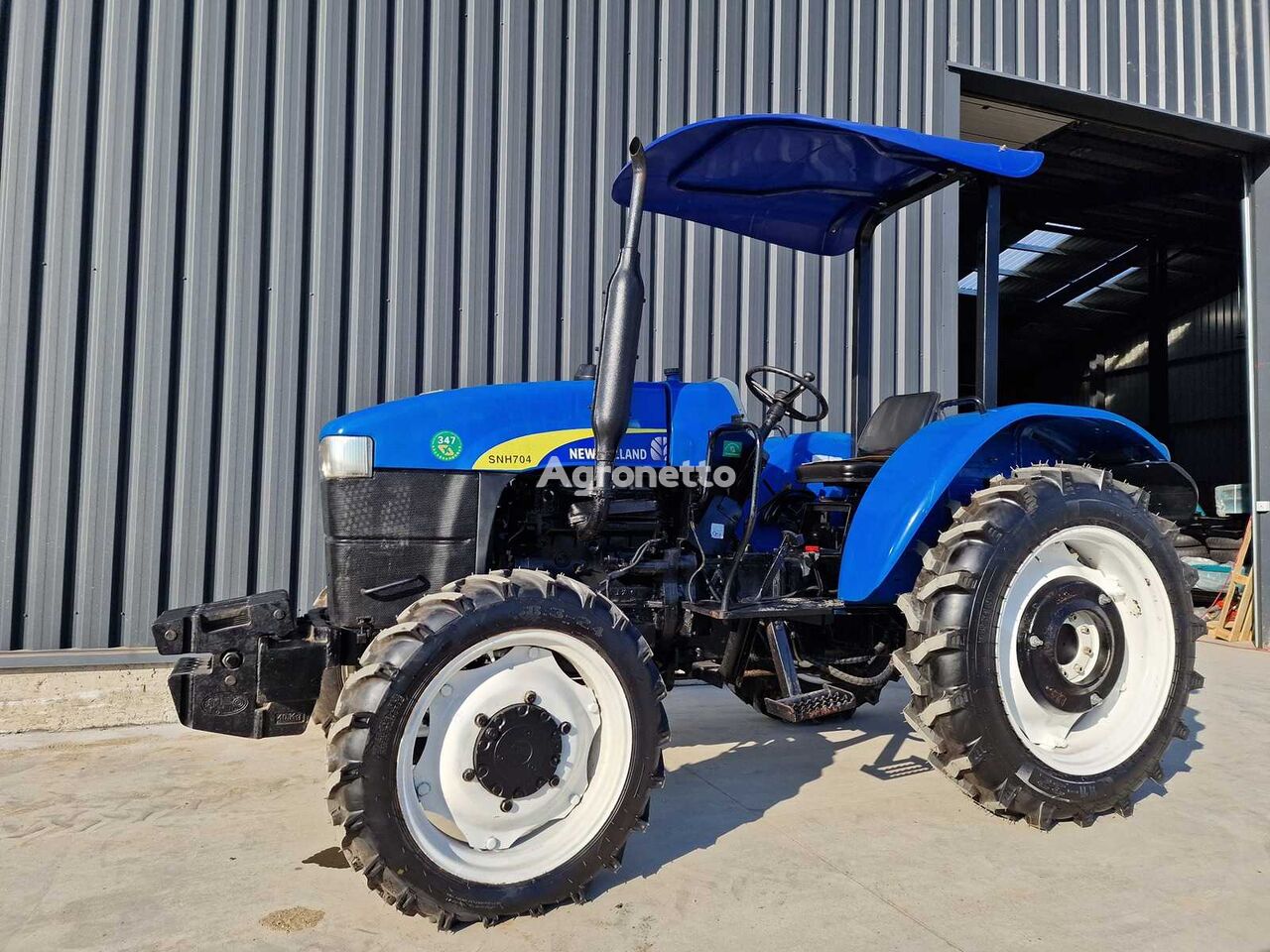 New Holland SNH 704 - 4-Wheel Drive Tractor - 2014 tractor de ruedas